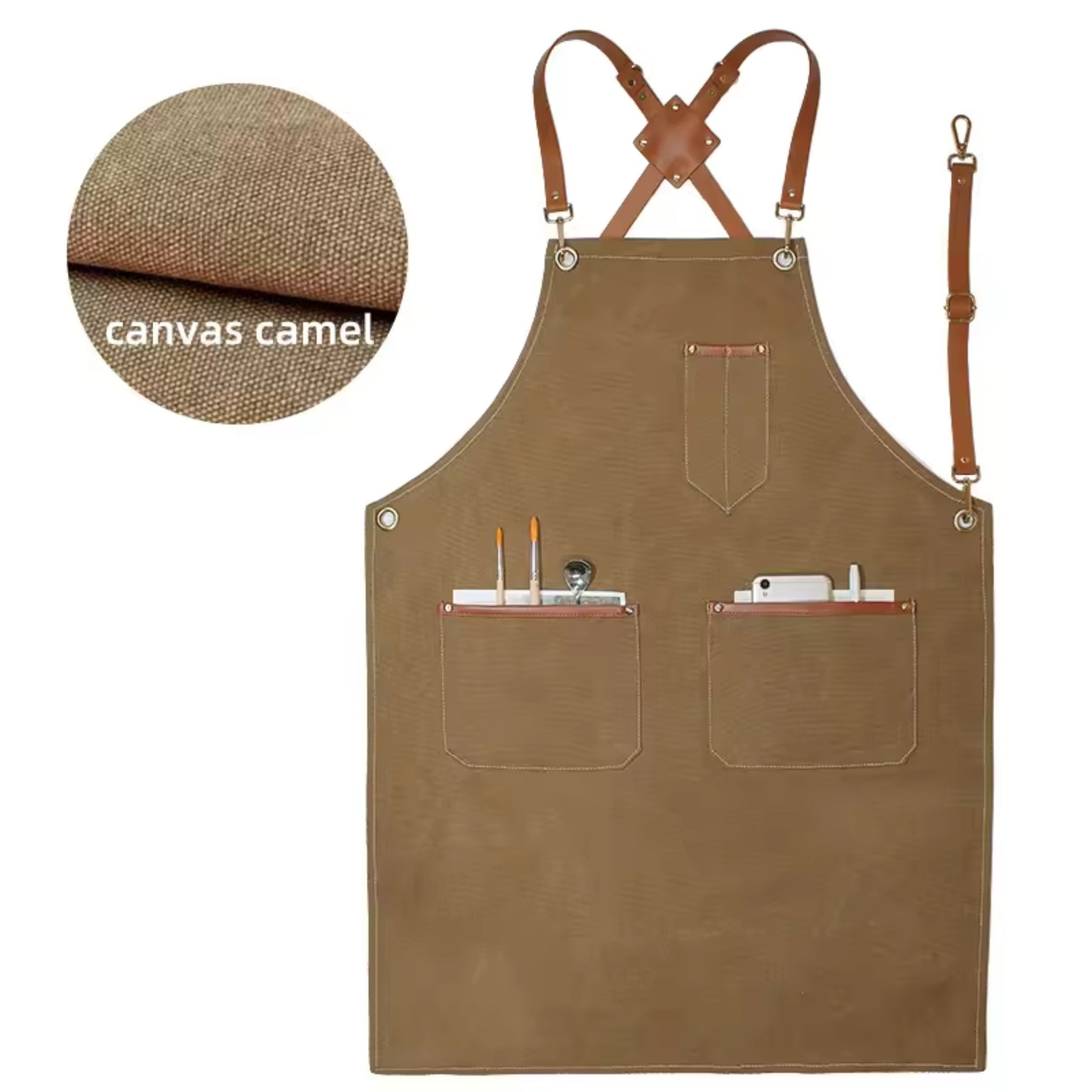 A camel brown canvas apron with tan leather straps and pockets, shown on a white background with a circular fabric close-up labeled 'canvas camel'.