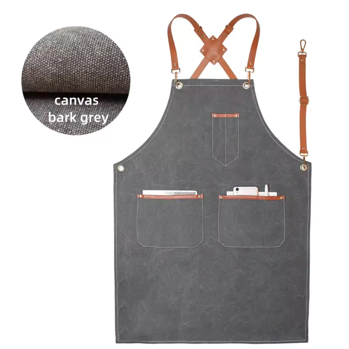 A dark gray canvas apron with brown leather straps and trim, featuring two front pockets. A circular inset on the top left shows a close-up of the canvas texture labeled 'canvas bark grey'.